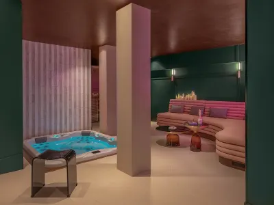 Boudoir des Muses - Spas privatifs Vénus et Hédoné, love room à Paris